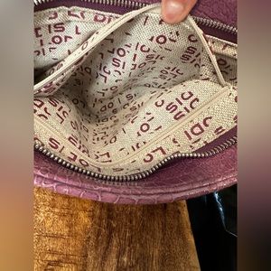 Pink vegan leather, about 13 inches long